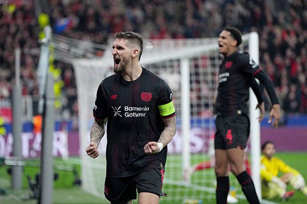 Robert Andrich celebrates after scoring for Bayer Leverkusen vs Arsenal