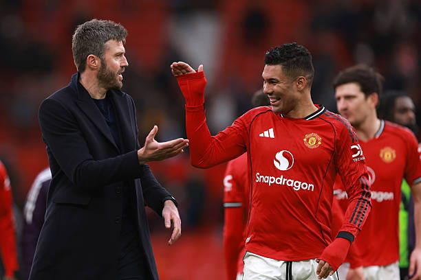 Casemiro celebrating with Michael Carrick after the game