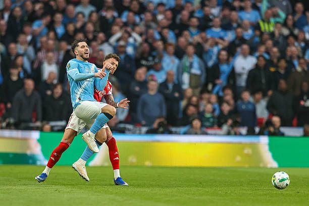 Ben White tackles Rayan Cherki