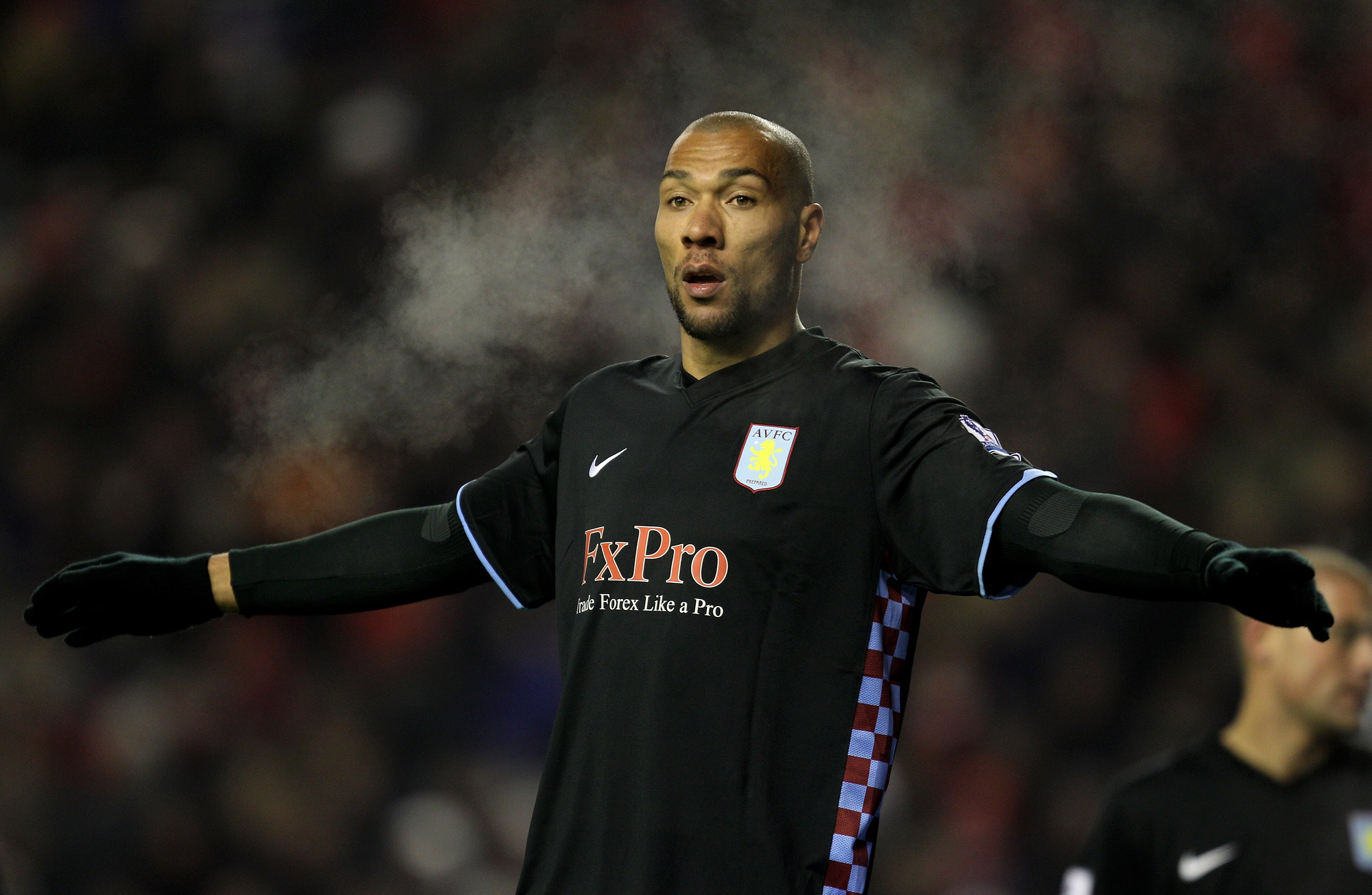 John Carew of Aston Villa looks on