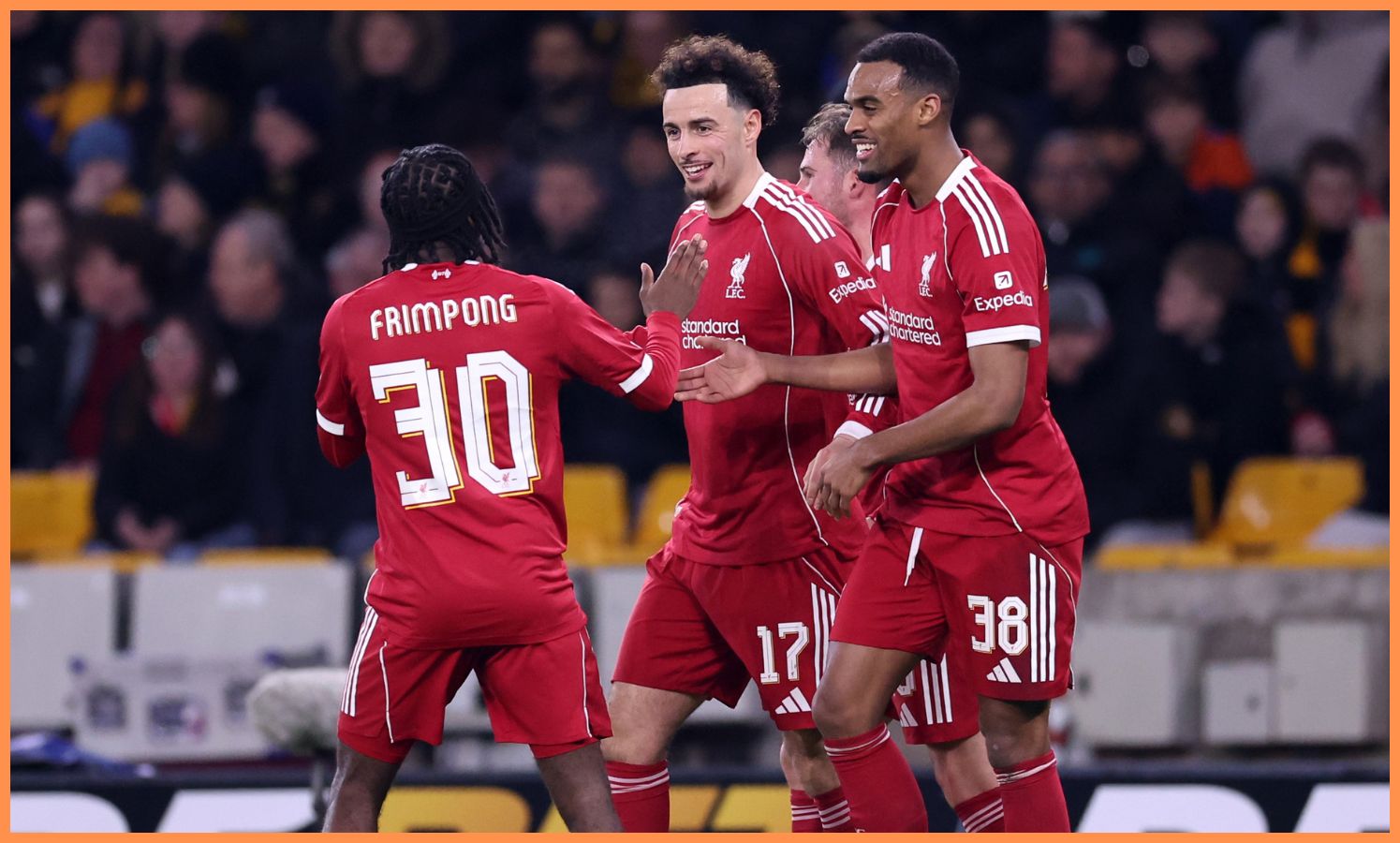 Curtis Jones celebrates with his Liverpool teammates