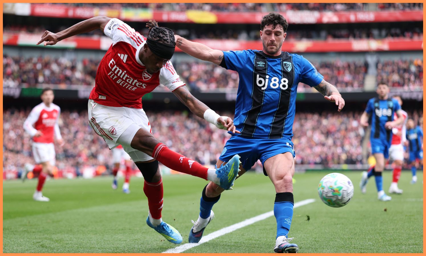 Noni Madueke in action against Marcos Senesi