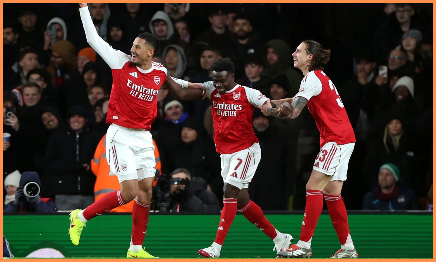 William Saliba celebrates with Bukayo Saka and Riccardo Calafiori