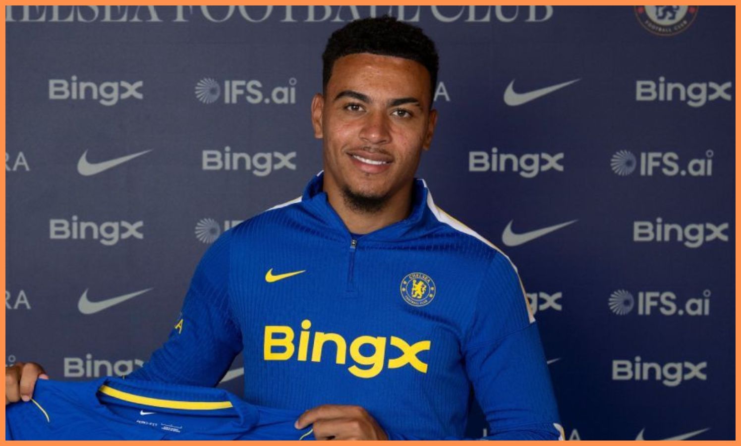 Morgan Rogers poses in Chelsea colours
