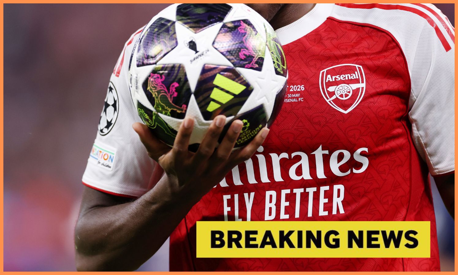 Arsenal player with Champions League ball