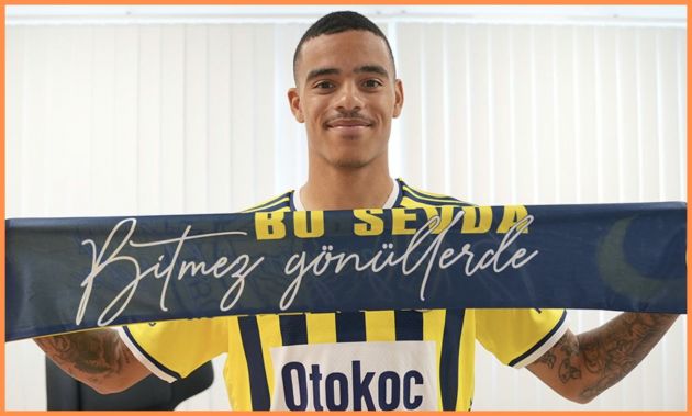 Mason Greenwood poses with a Fenerbahce scarf