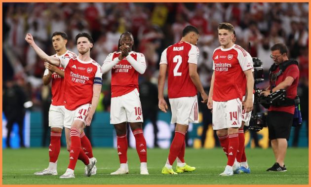 Arsenal players react during the Champions League final penalty shoot-out vs PSG