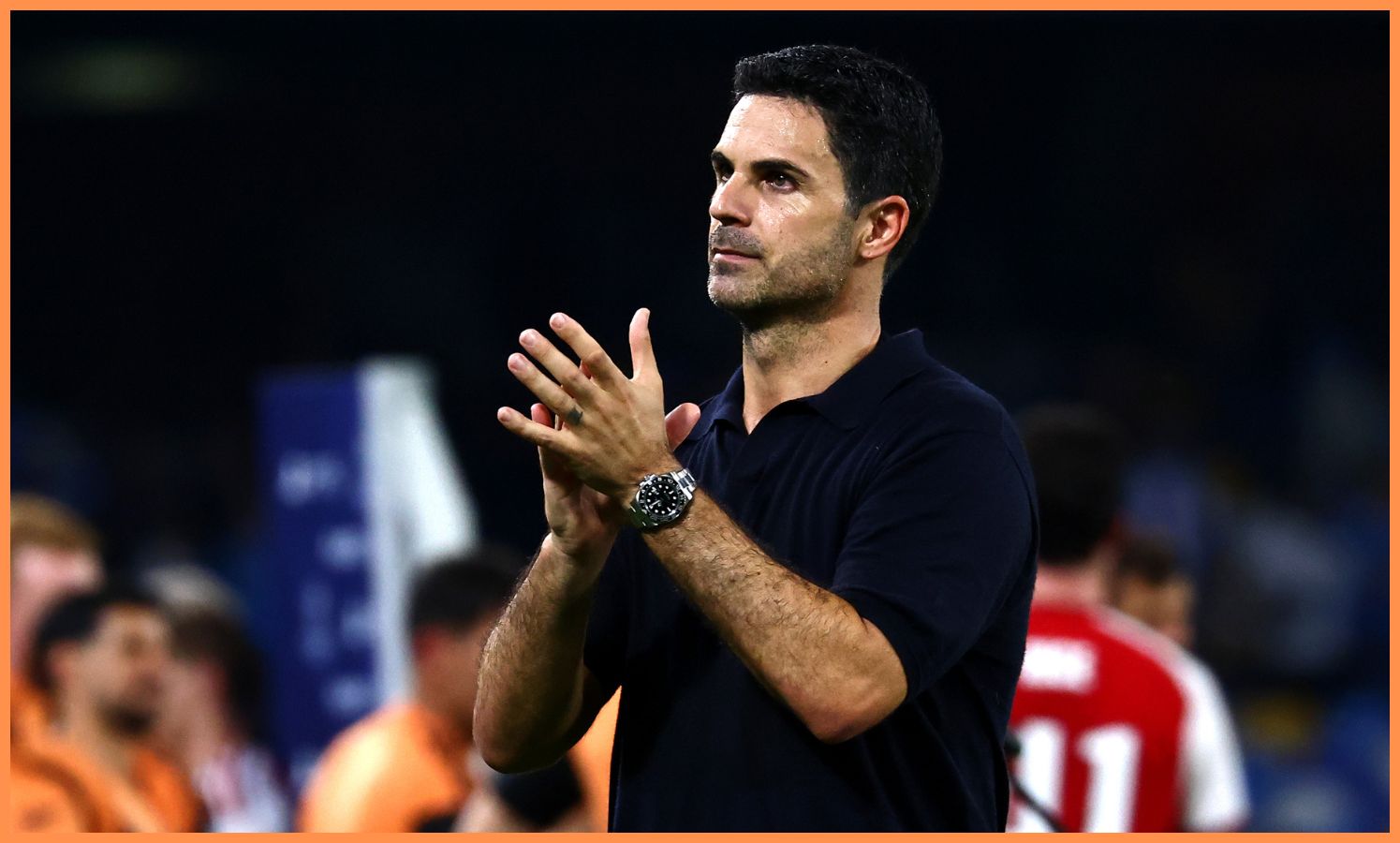 Mikel Arteta applauds the fans as Arsenal beat Napoli