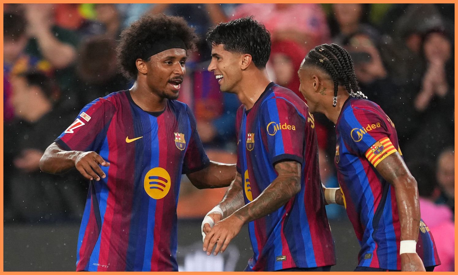 Raphinha celebrates with his Barcelona teammates