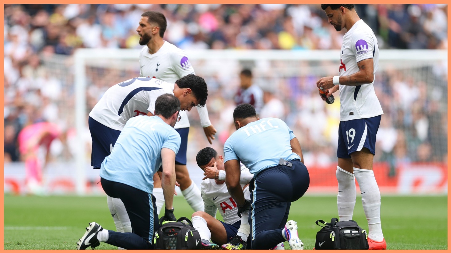 Pedro Porro is treated after going down with injury against Aston Villa