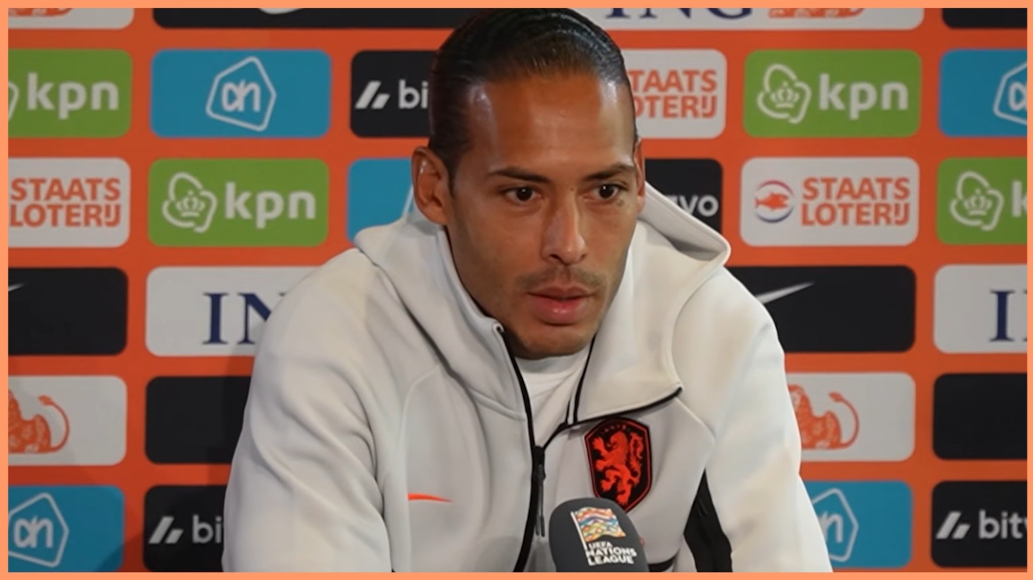 Virgil van Dijk speaks to reporters at a press conference