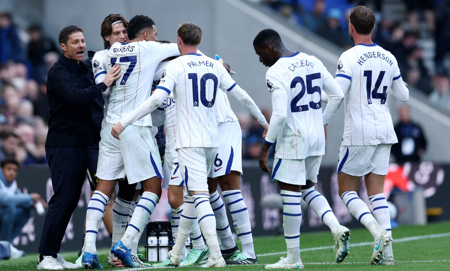 LIVERPOOL, ENGLAND - OCTOBER 17: Pedro Neto of Chelsea celebrates scoring his team’s second goal with teammates and Xabi Alonso, Manager of Chelsea, during the Premier League 2026/27 match between Everton and Chelsea FC at Hill Dickinson Stadium on October 17, 2026 in Liverpool, England.
