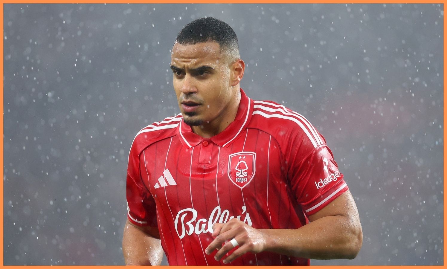 Murillo playing in the rain.