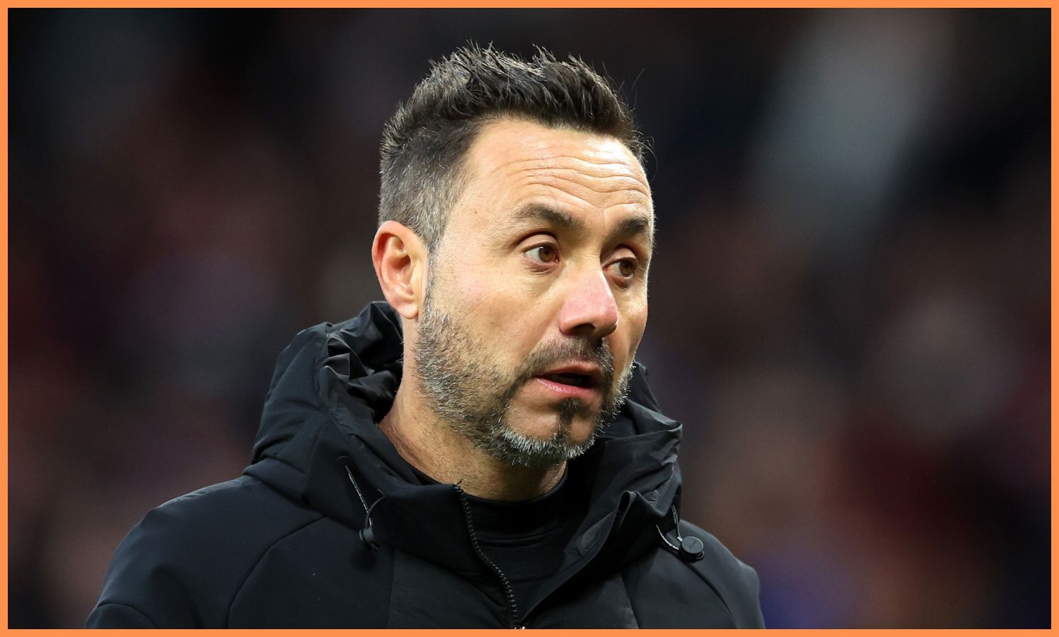 Tottenham manager Roberto De Zerbi looks on