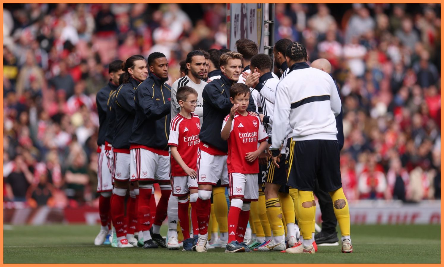 Arsenal players lining up at the Emirates Stadium