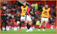 Diogo Dalot warming up for Manchester United