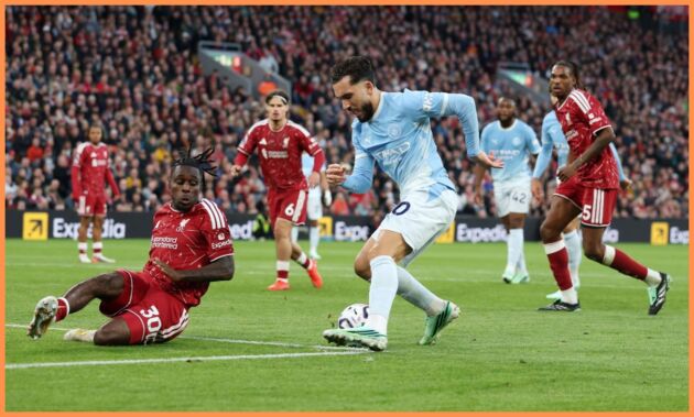 Rayan Cherki dribbles past Jeremie Frimpong
