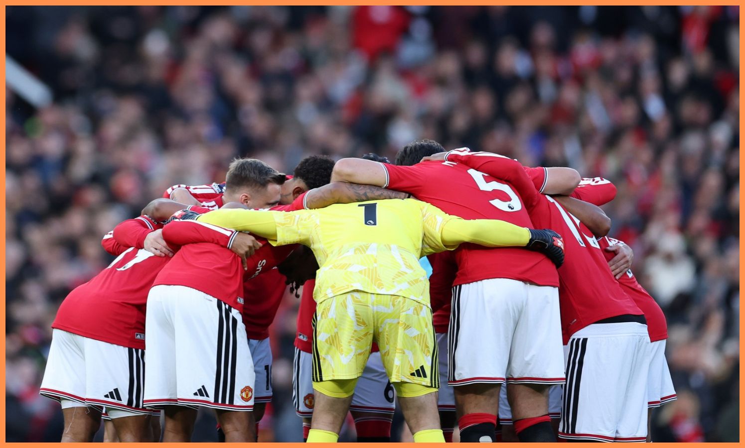 Manchester United players in a huddle