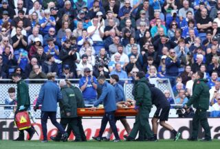 Emiliano Martinez is stretchered off during Everton vs Chelsea
