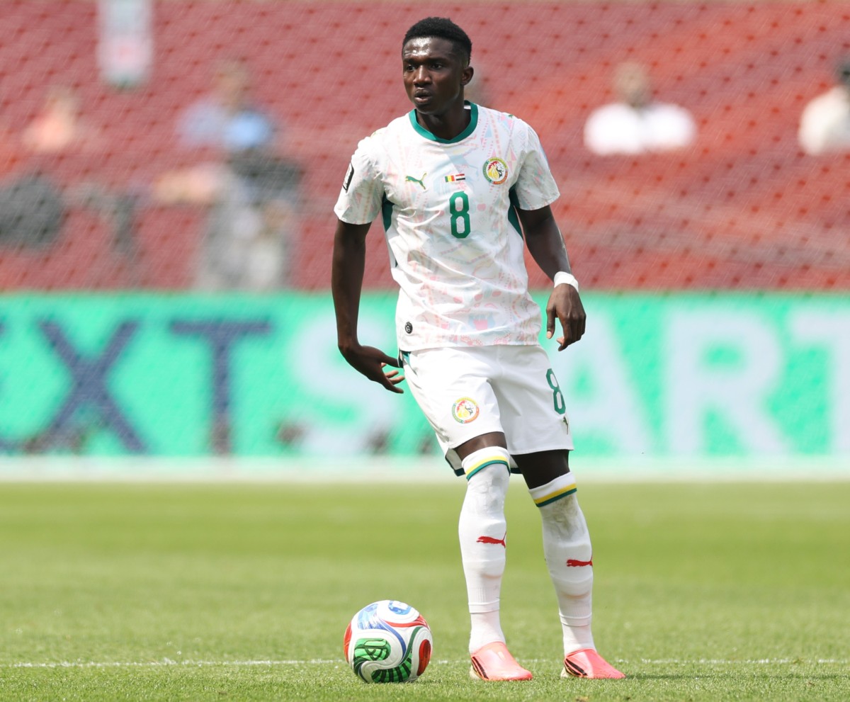 Senegal midfielder Lamine Camara in action