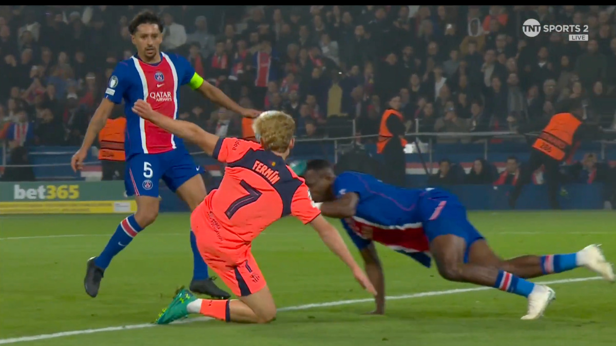 Fermin Lopez's shot is blocked by Pacho.