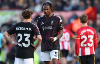 BRENTFORD, ENGLAND - OCTOBER 17: Jeremy Jacquet of Liverpool celebrates with teammate Victor Munoz after Yehor Yarmolyuk of Brentford (not pictured) is awarded a red card following a VAR review during the Premier League 2026/27 match between Brentford and Liverpool FC at Gtech Community Stadium on October 17, 2026 in Brentford, England.