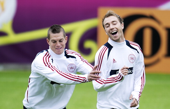 Danish defender Daniel Agger (L) and Dan