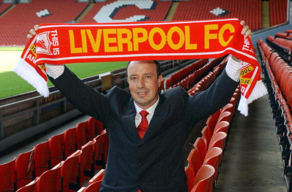 Spaniard Rafael Benitez hold up a Liverp