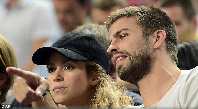 Shakira and Gerard Pique at a basketball game in Barcelona