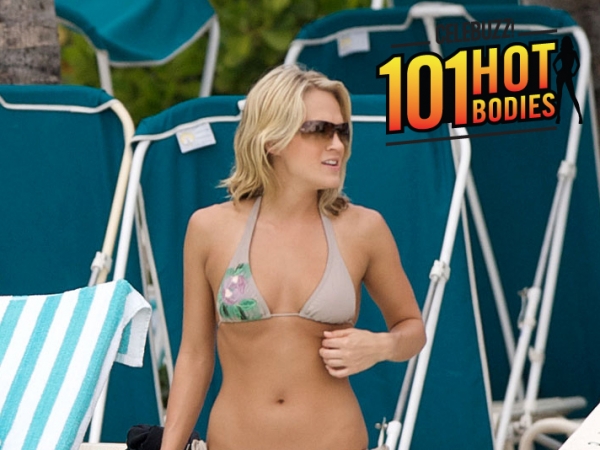 Carrie Underwood sizzles in red string bikini during break from