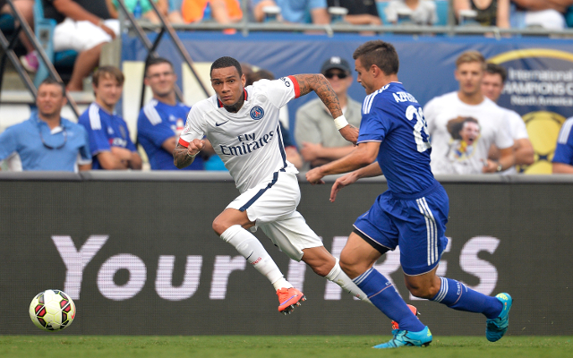 Gregory van der Wiel of the Netherlands eyes the ball during a