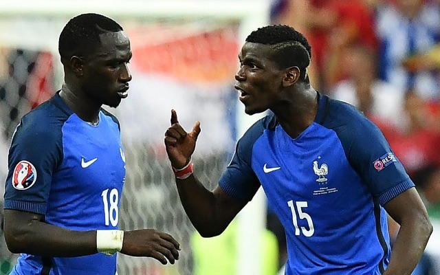 Moussa Sissoko and Paul Pogba argue