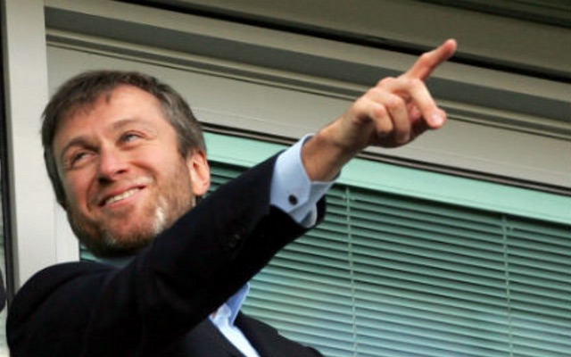 Chelsea owner Roman Abramovich pointing and laughing