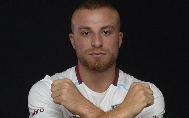 Gokhan Tore Hammers sign