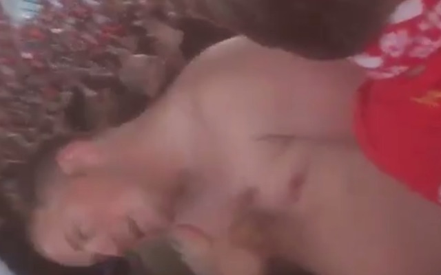 Topless Liverpool fans rubs nipple as Reds go 3-0 up against Barcelona