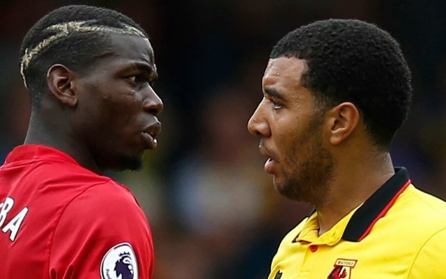 Paul Pogba and Troy Deeney during Watford 3-1 Man United