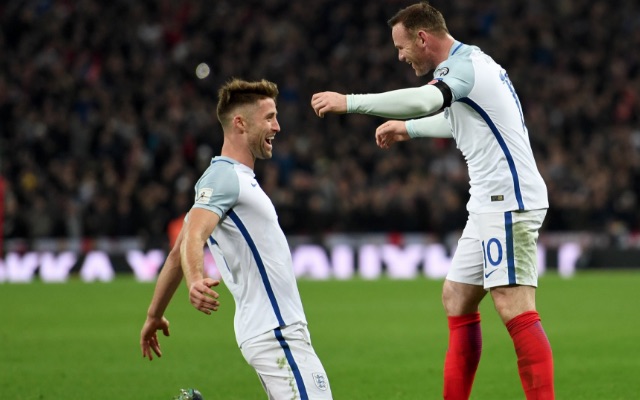 Gary Cahill celebrates England goal v Scotland with Wayne Rooney