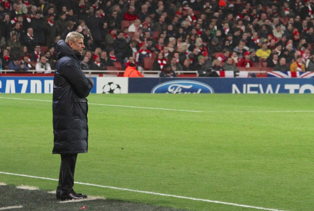 Arsene Wenger looks on