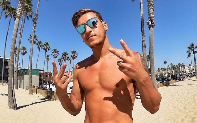 Topless Mesut Ozil poses for his Instagram followers