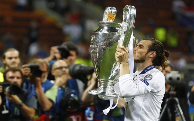 Bale celebrates with Champions League trophy