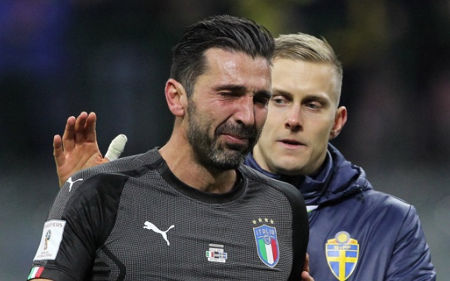 Gianluigi Buffon leaves the pitch looking emotional after ending his international career