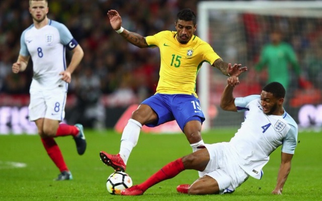 Joe Gomez tackles Paulinho during England 0-0 Brazil