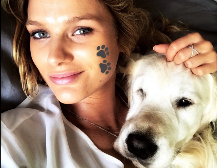 Mayte Rodriguez shared a cute moment with one of Alexis Sanchez's golden retrievers