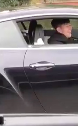 Tottenham ace Son Heung-min laughs in his car