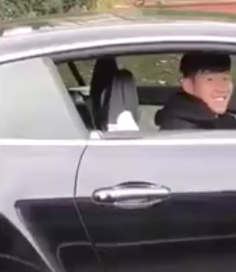 Tottenham star Son Heung-min sits in his car as he is racially abused by a moronic West Ham fan