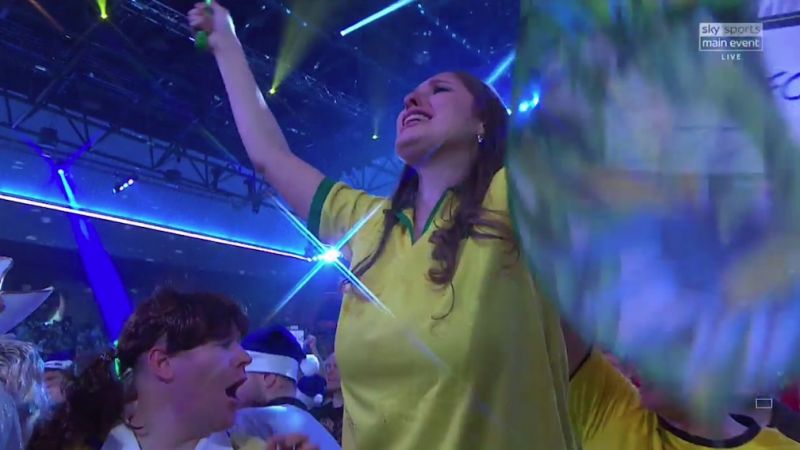 The darts WAG proudly flew the Brazilian flag