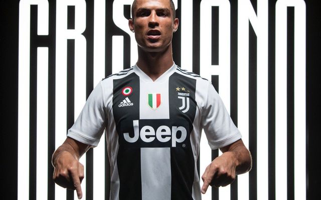 Cristiano Ronaldo of Juventus FC holds a jersey with the number 700 News  Photo - Getty Images