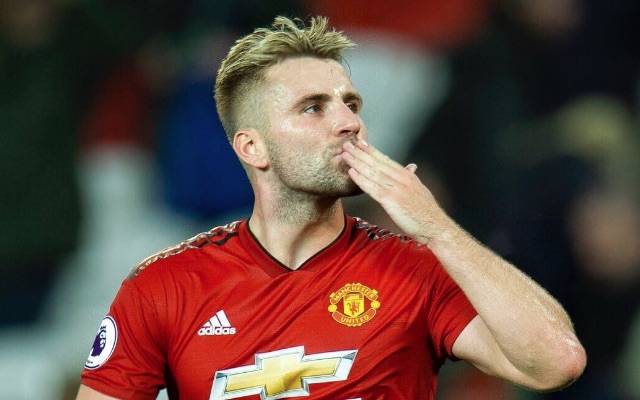 Man United left-back Luke Shaw blows a kiss to the crowd