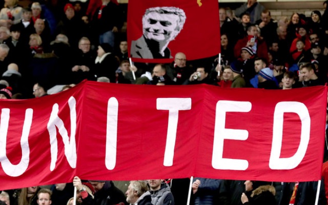 Positive Man United fans raise a banner