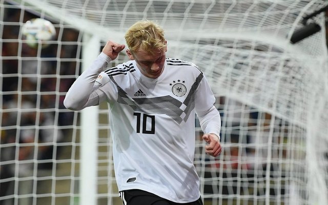 Brandt scores stunning chip for Germany